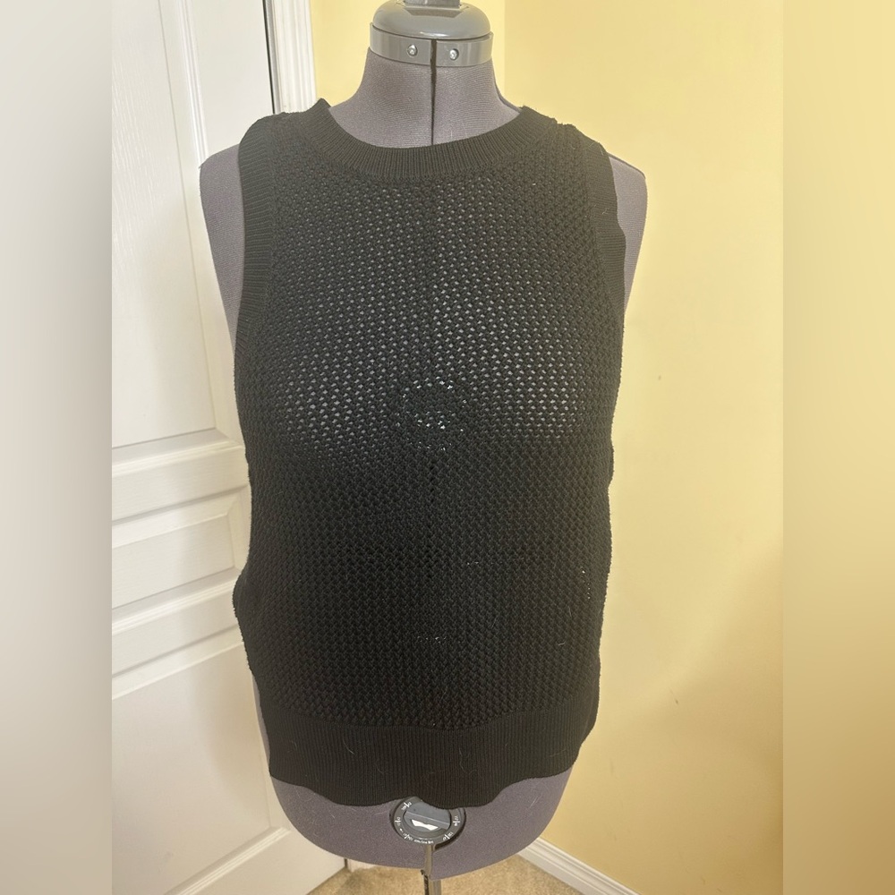 Lululemon knit sweater vest with metal logo on back
